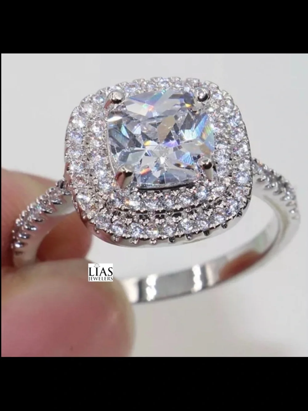 New 18k white gold engagement ring